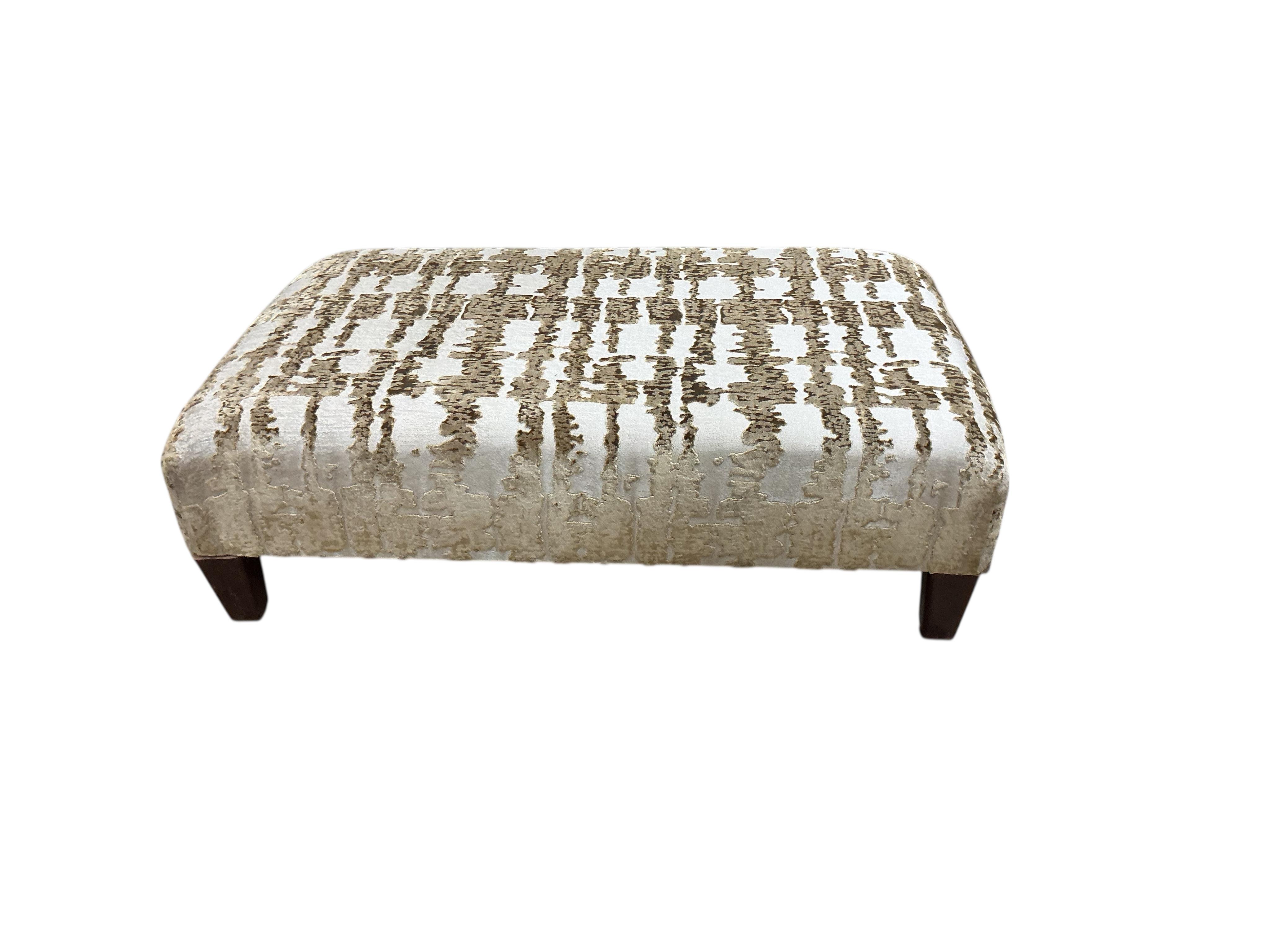 A Contemporary rectangular upholstered stool, width 98cm, depth 65cm, height 30cm